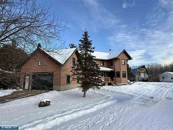 25 Acres of Land with Home for Sale in Hibbing, Minnesota