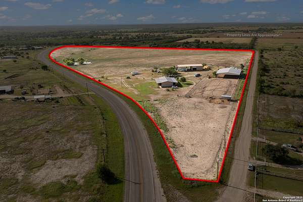 25.8 Acres of Land with Home for Sale in Natalia, Texas
