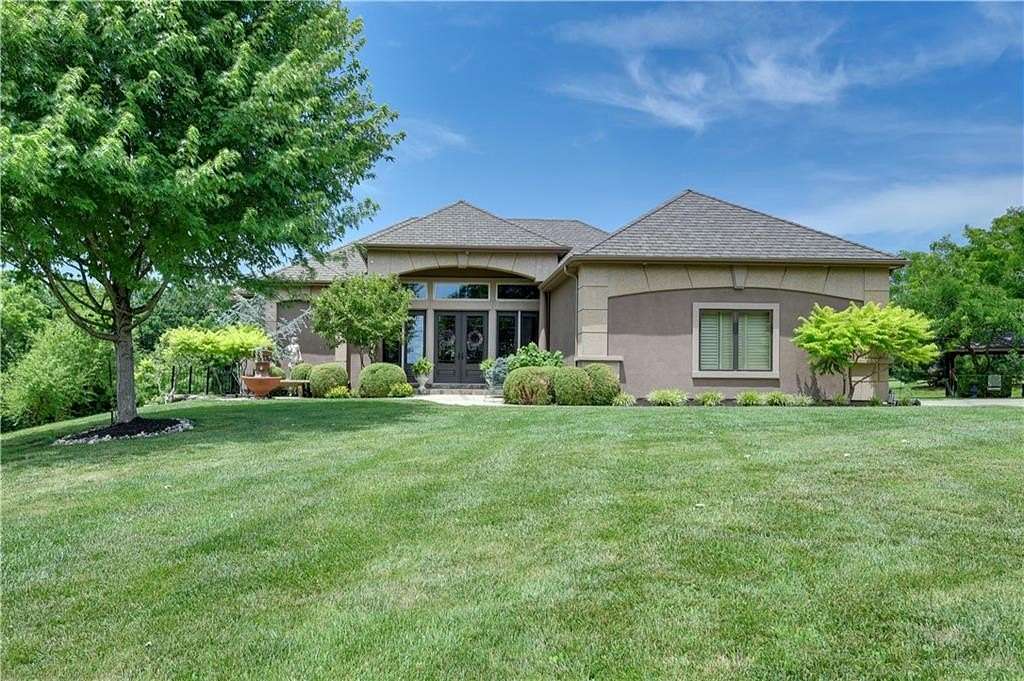 3 Acres of Residential Land with Home for Sale in Loch Lloyd, Missouri