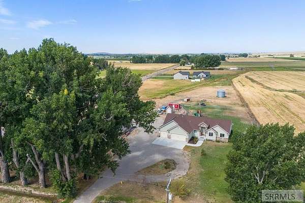 5 Acres of Residential Land with Home for Sale in Rigby, Idaho