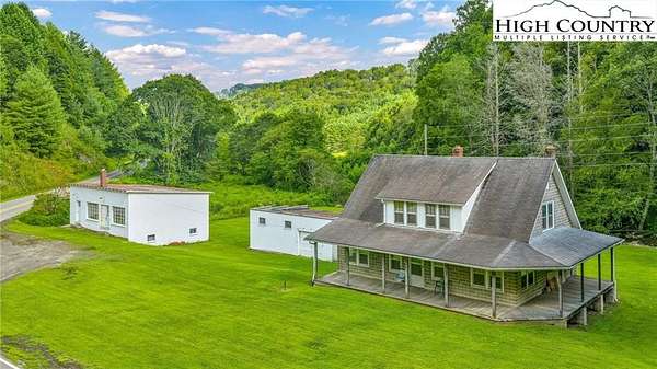 8.23 Acres of Residential Land with Home for Sale in Lansing, North Carolina