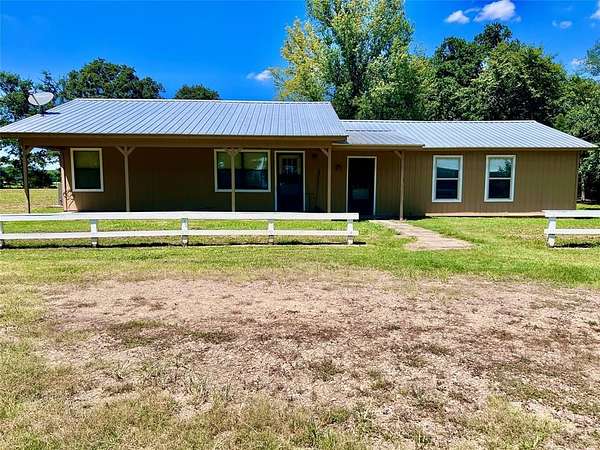 2.39 Acres of Residential Land with Home for Sale in Paris, Texas