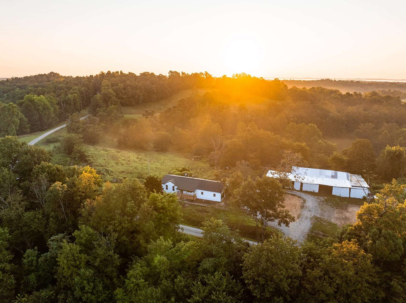 34 Acres of Land with Home for Sale in Blue Rock, Ohio