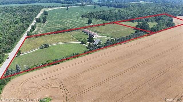 24.6 Acres of Agricultural Land with Home for Sale in Clyde Township, Michigan