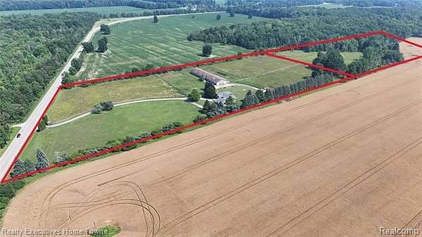 24.6 Acres of Agricultural Land with Home for Sale in Clyde Township, Michigan