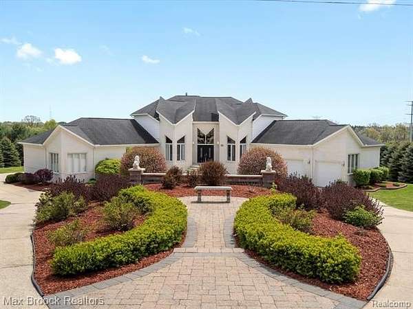 3.33 Acres of Residential Land with Home for Sale in Leonard, Michigan