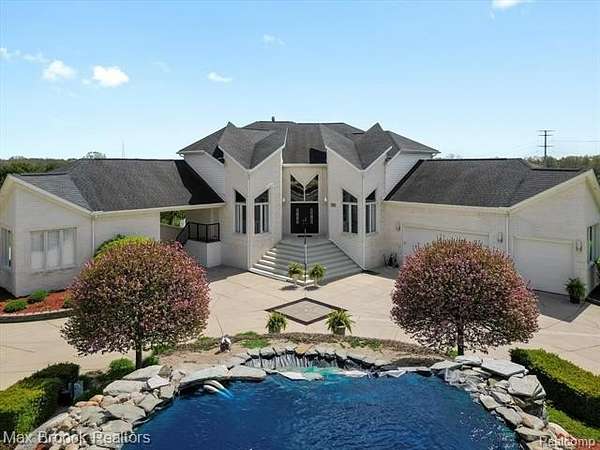 3.33 Acres of Land with Home for Sale in Leonard, Michigan