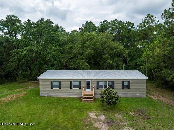 2 Acres of Residential Land with Home for Sale in Callahan, Florida