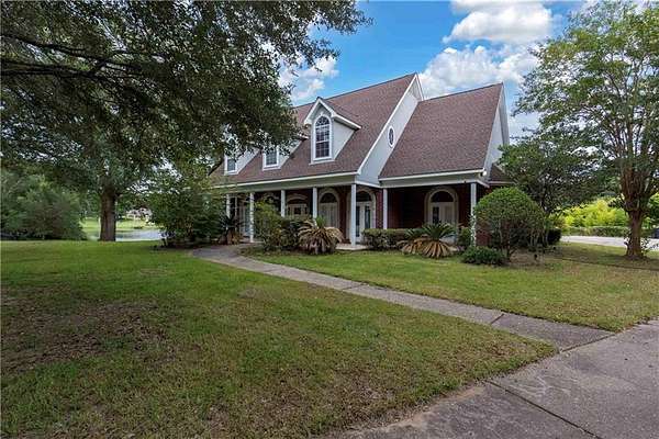 2.77 Acres of Residential Land with Home for Sale in Grand Bay, Alabama