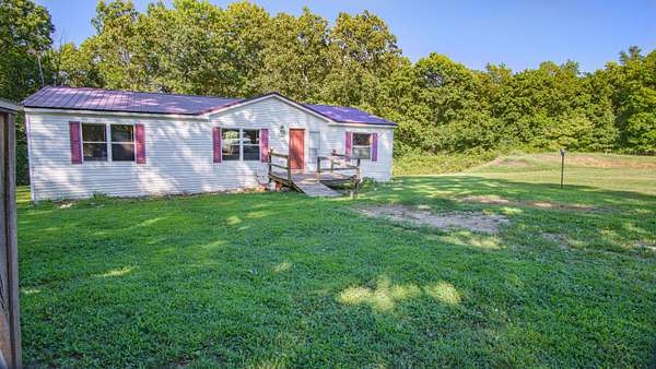 5 Acres of Residential Land with Home for Sale in Willow Springs, Missouri