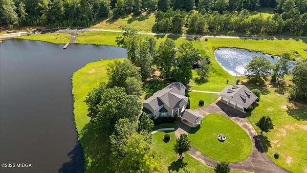 8.46 Acres of Residential Land with Home for Sale in Forsyth, Georgia