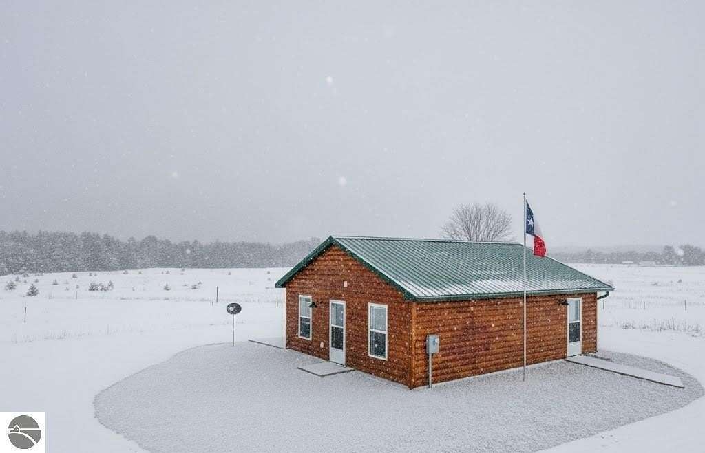 2.5 Acres of Residential Land with Home for Sale in Kingsley, Michigan