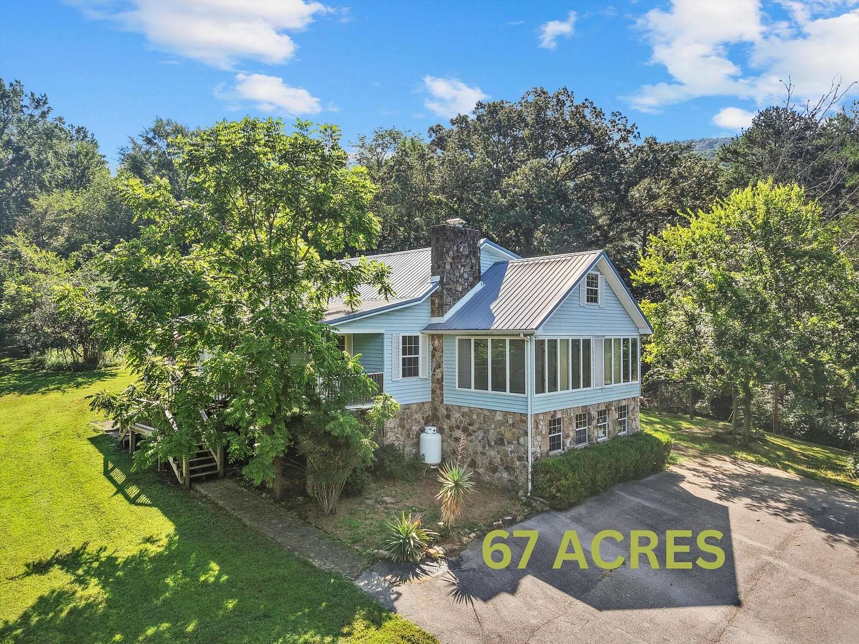 67.1 Acres of Land with Home for Sale in Dunlap, Tennessee