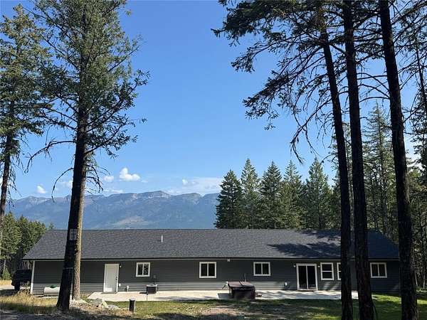 4.88 Acres of Residential Land with Home for Sale in Bigfork, Montana