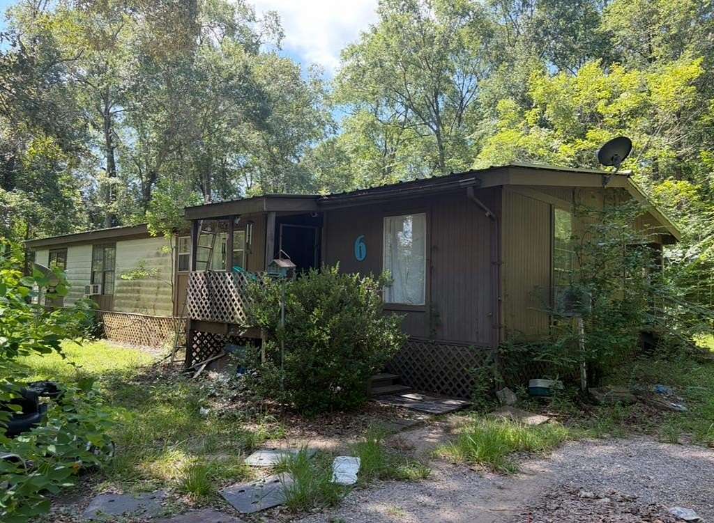 3.65 Acres of Land with Home for Sale in Huntington, Texas