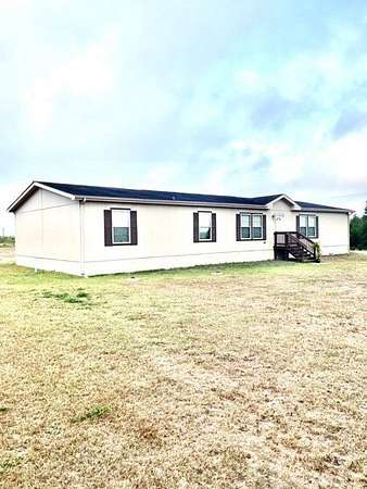 6.32 Acres of Residential Land with Home for Sale in Orange Grove, Texas