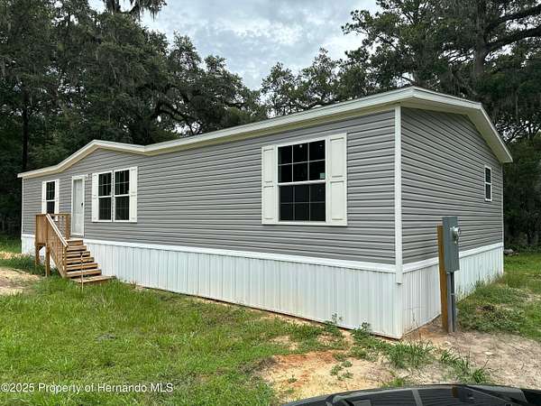 4 Acres of Residential Land with Home for Sale in Nobleton, Florida