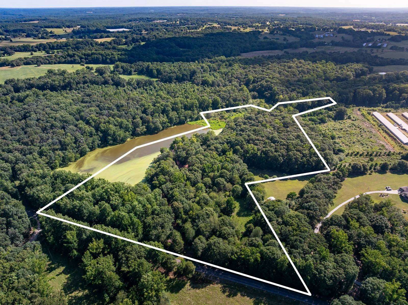21.4 Acres of Land with Home for Sale in Royston, Georgia