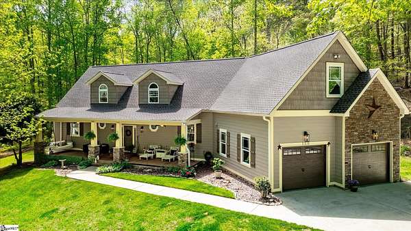 5.3 Acres of Residential Land with Home for Sale in Travelers Rest, South Carolina