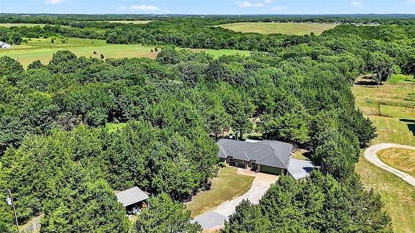 5 Acres of Land with Home for Sale in Sherman, Texas