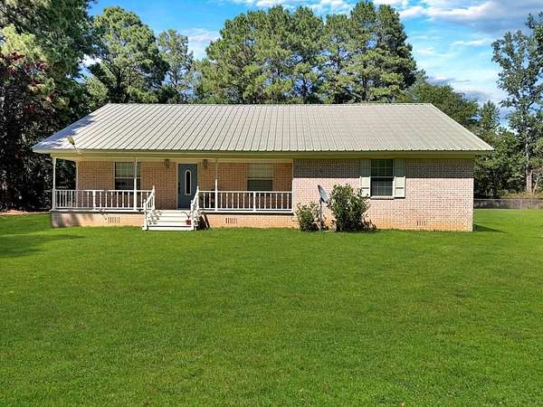 2.26 Acres of Residential Land with Home for Sale in Timpson, Texas