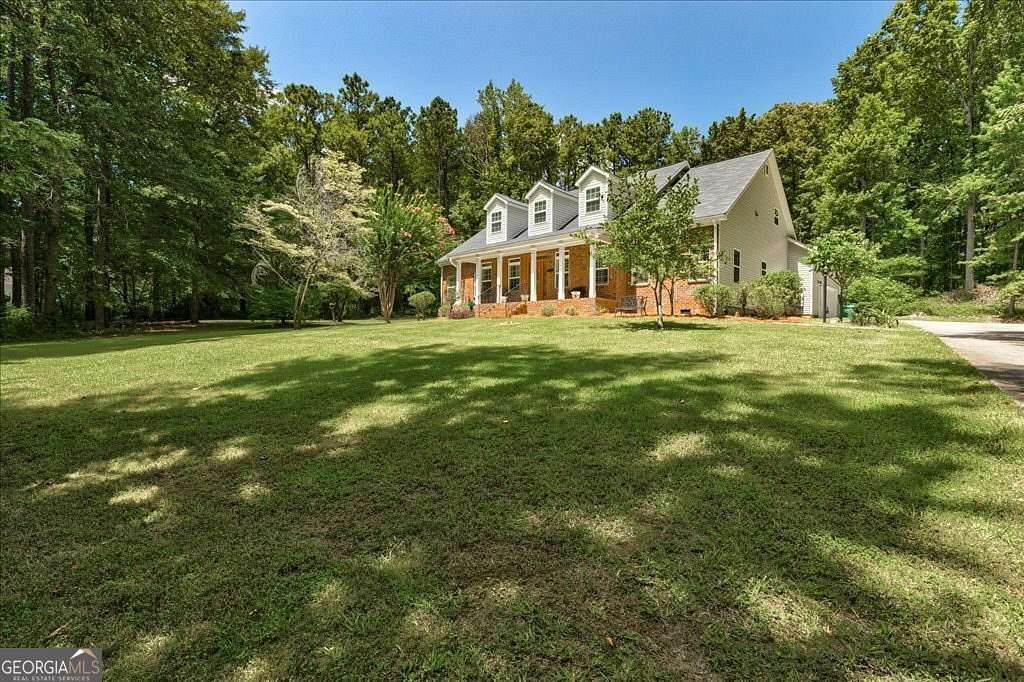 6.38 Acres of Land with Home for Sale in Hampton, Georgia