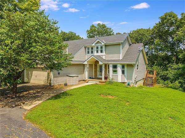 25 Acres of Land with Home for Sale in Smithville, Missouri