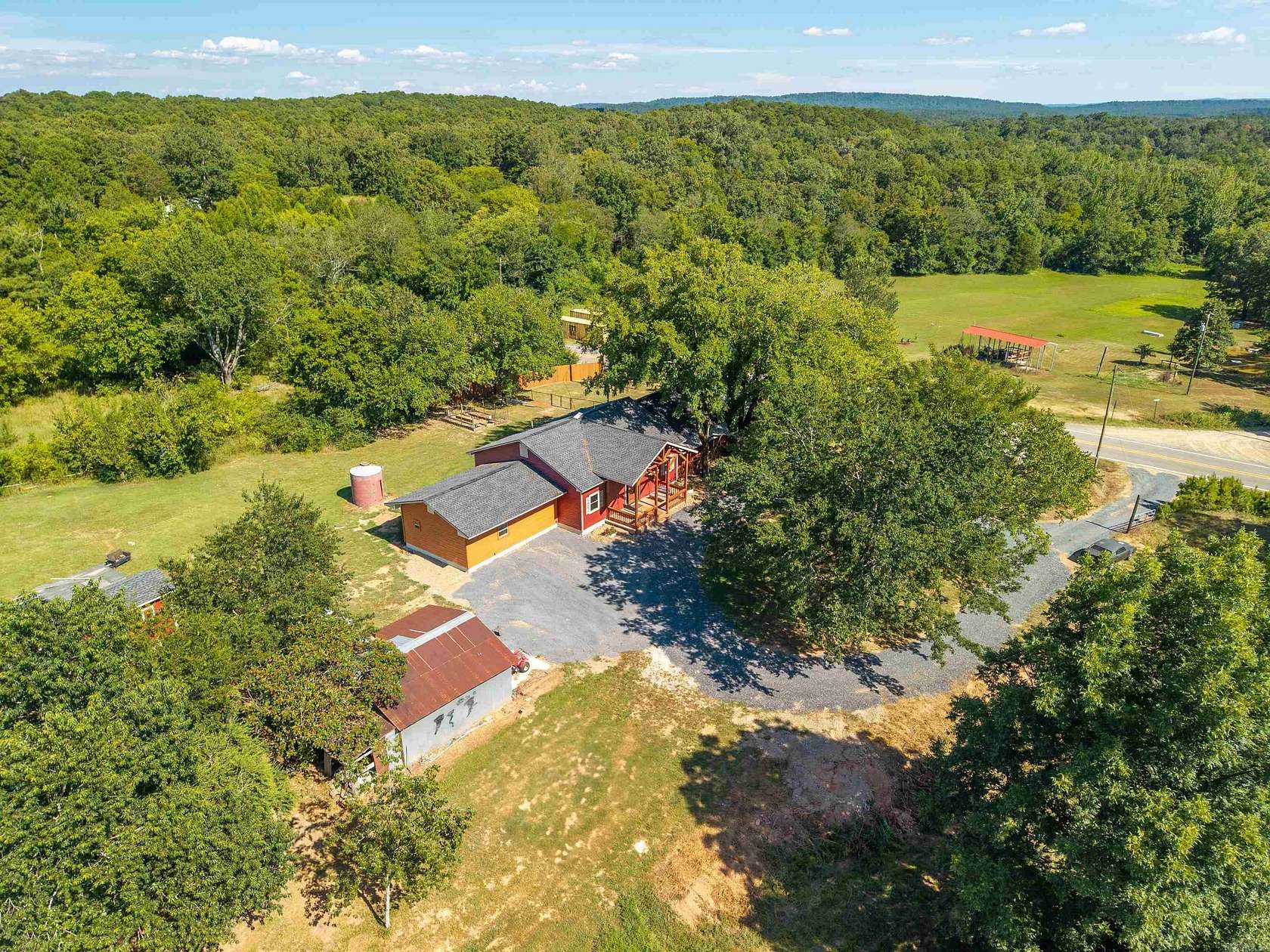 5 Acres of Residential Land with Home for Sale in Sims, Arkansas