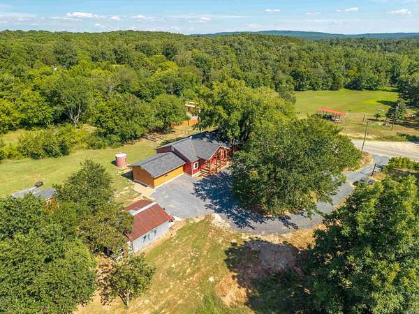 5 Acres of Residential Land with Home for Sale in Sims, Arkansas