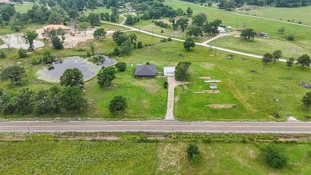 5.5 Acres of Residential Land with Home for Sale in Ben Wheeler, Texas