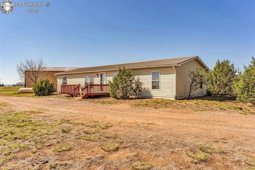 9.78 Acres of Land with Home for Sale in Penrose, Colorado