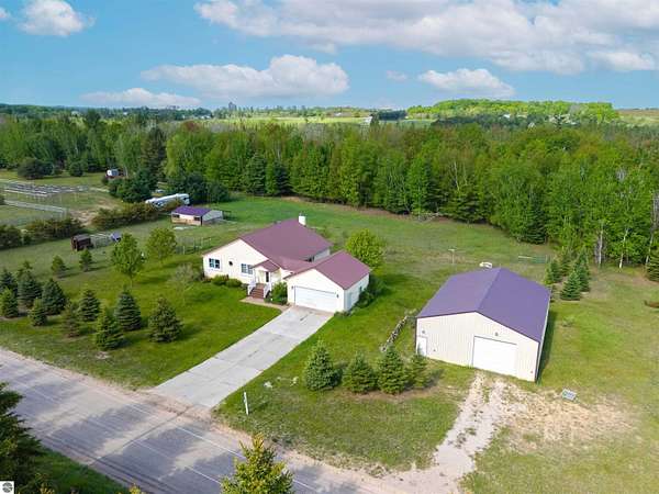 5.2 Acres of Land with Home for Sale in Williamsburg, Michigan