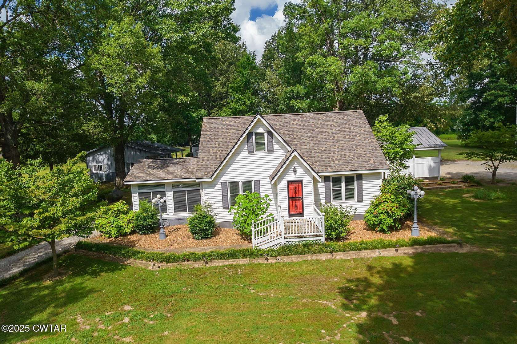 11.5 Acres of Land with Home for Sale in Alamo, Tennessee