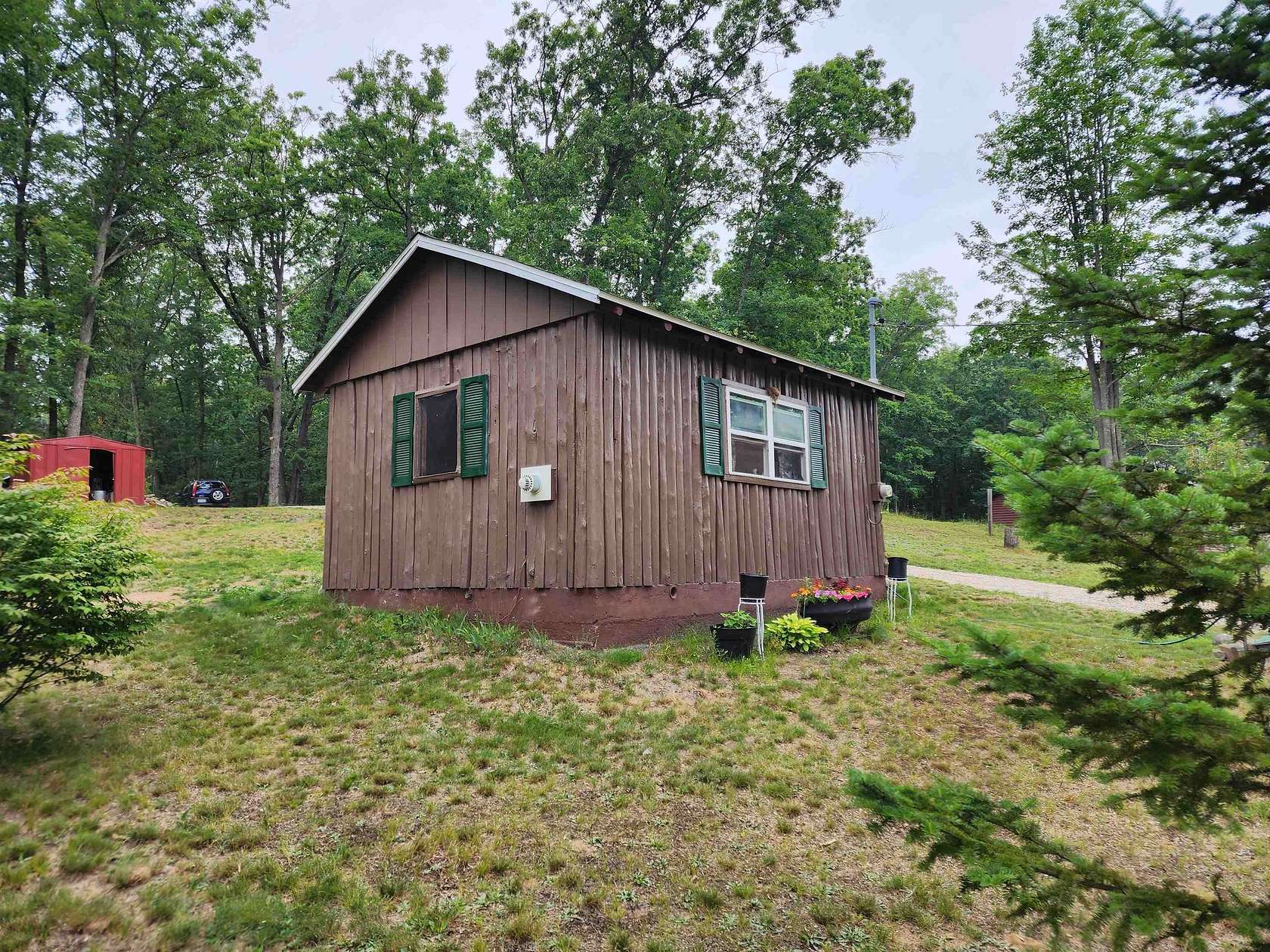 1.24 Acres of Residential Land with Home for Sale in Harrison, Michigan