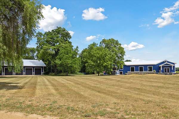 5.5 Acres of Residential Land with Home for Sale in Howard City, Michigan