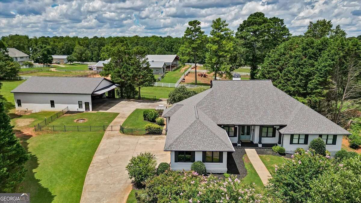 1.6 Acres of Residential Land with Home for Sale in Locust Grove, Georgia