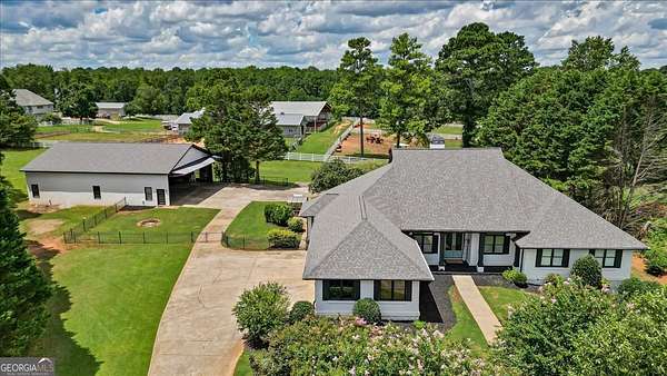 1.6 Acres of Residential Land with Home for Sale in Locust Grove, Georgia