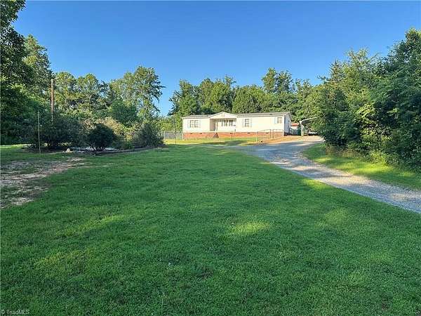 2.37 Acres of Residential Land with Home for Sale in Sandy Ridge, North Carolina