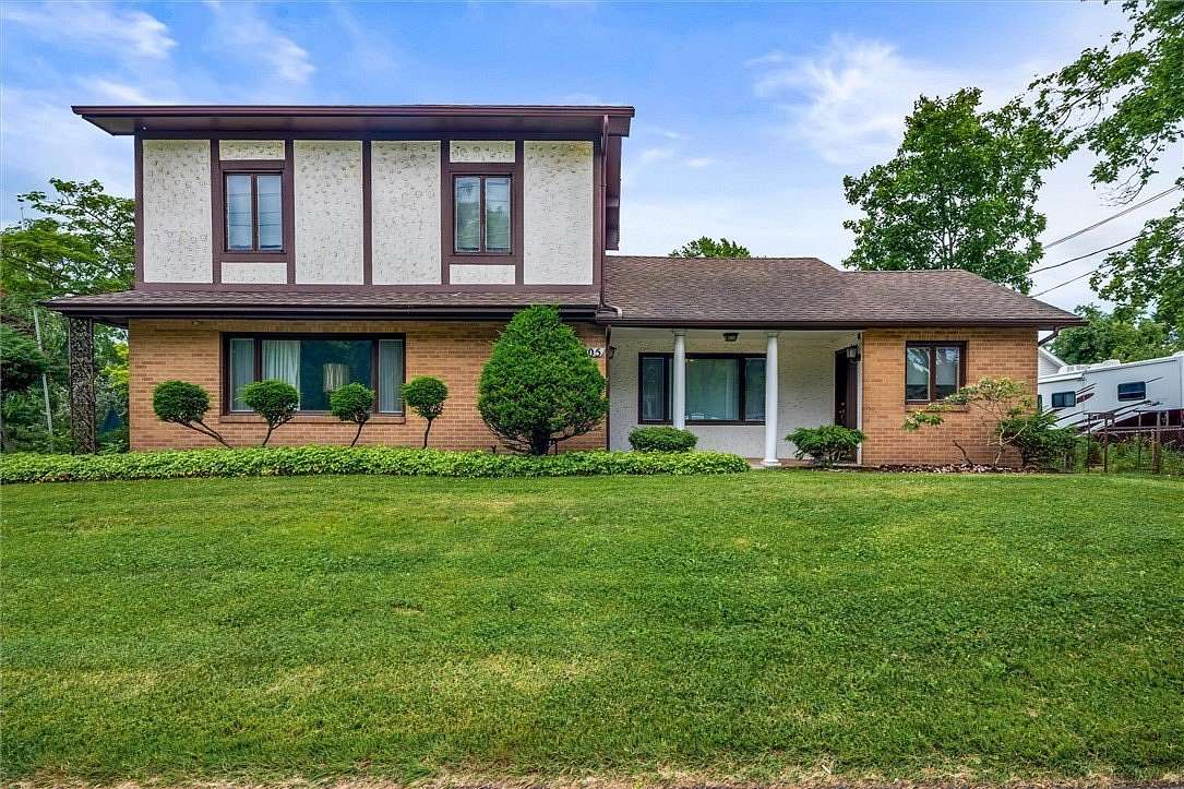 12 Acres of Land with Home for Sale in Spencerport, New York