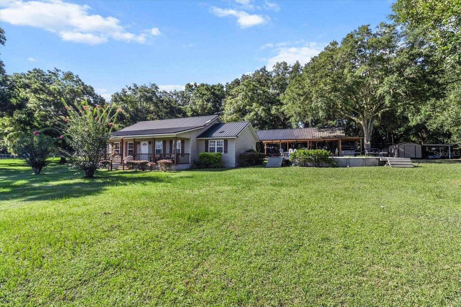 5 Acres of Residential Land with Home for Sale in Williston, Florida