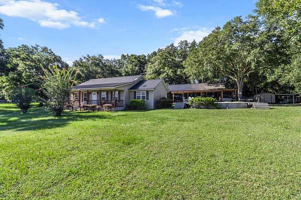 5 Acres of Residential Land with Home for Sale in Williston, Florida