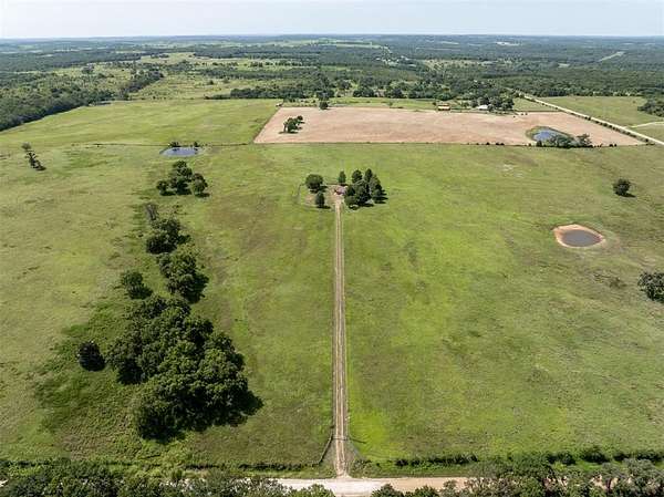 80 Acres of Land with Home for Sale in Okemah, Oklahoma