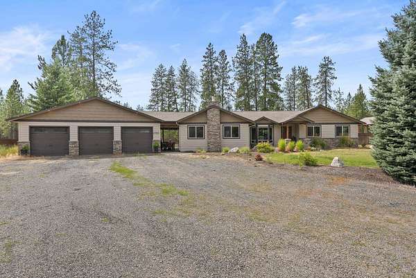 5.72 Acres of Residential Land with Home for Sale in Colbert, Washington