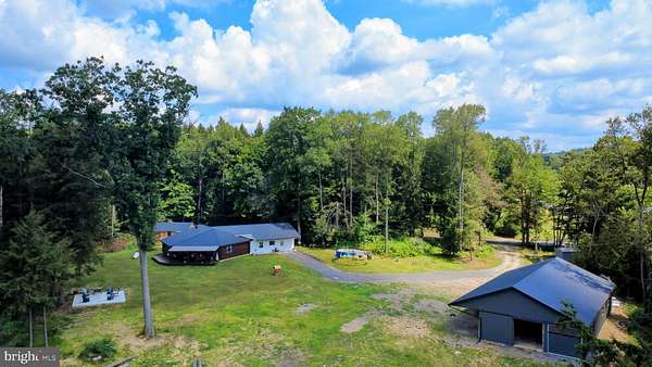 25.7 Acres of Land with Home for Sale in Reynoldsville, Pennsylvania