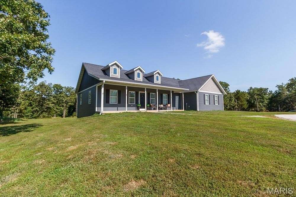 12 Acres of Land with Home for Sale in Lebanon, Missouri