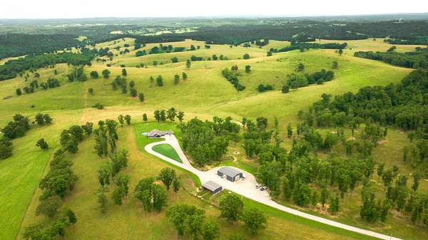 1,125 Acres of Agricultural Land with Home for Sale in Ava, Missouri