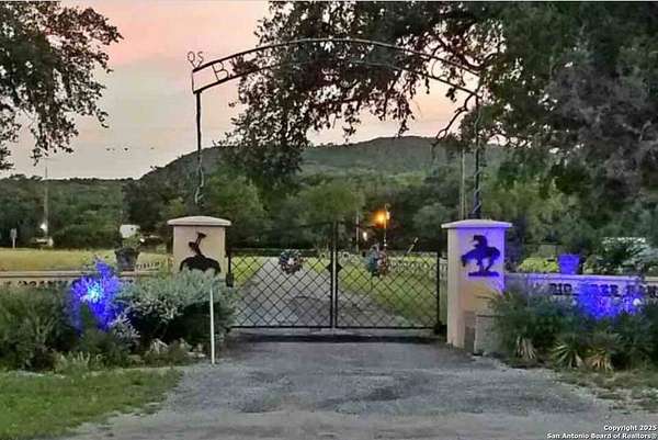 5 Acres of Residential Land with Home for Sale in Concan, Texas