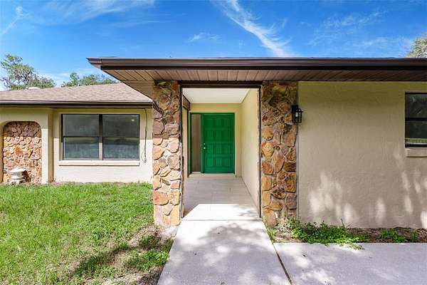 5.26 Acres of Residential Land with Home for Sale in Dunnellon, Florida