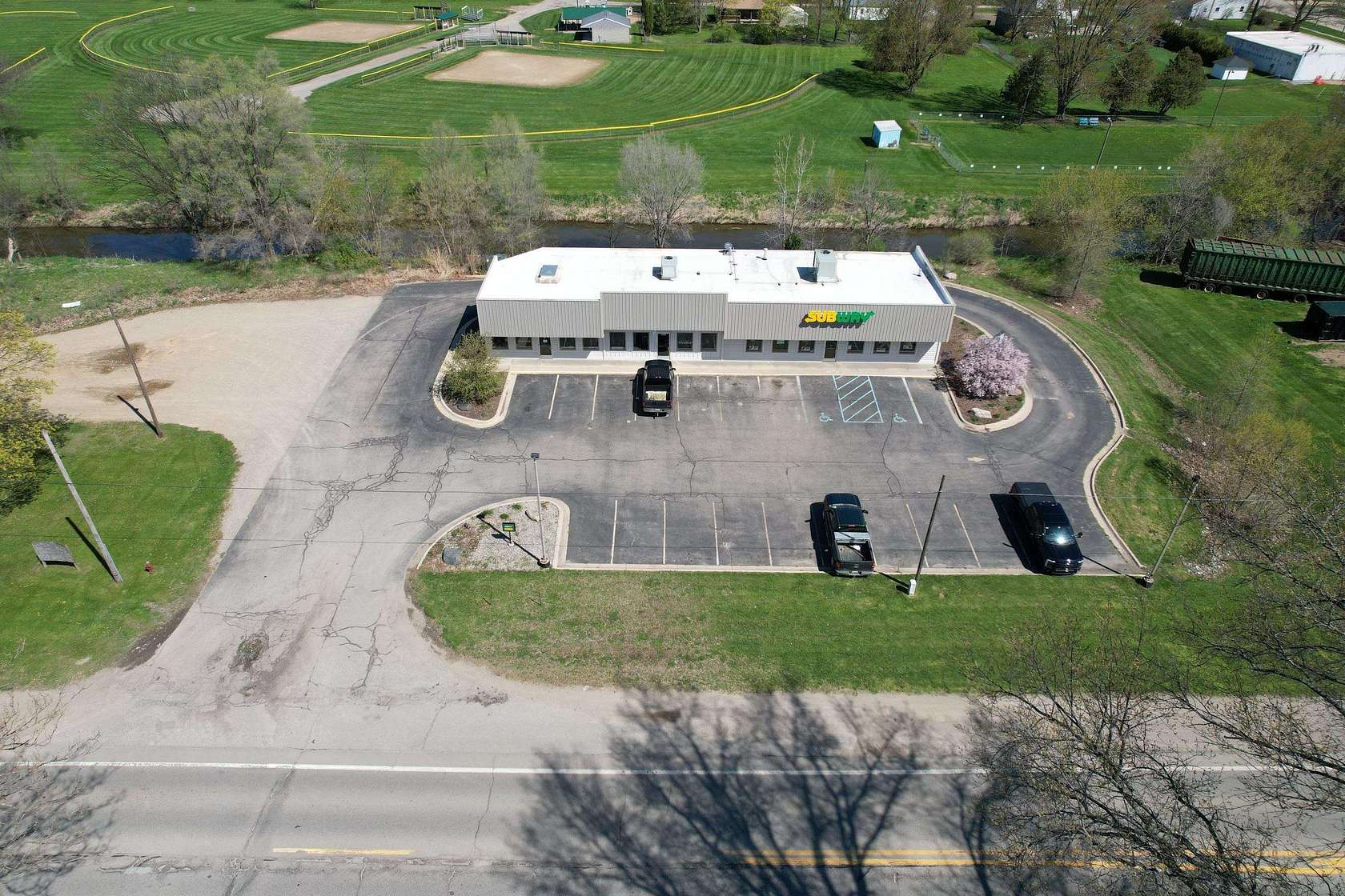 1.5 Acres of Improved Commercial Land for Sale in Ovid, Michigan