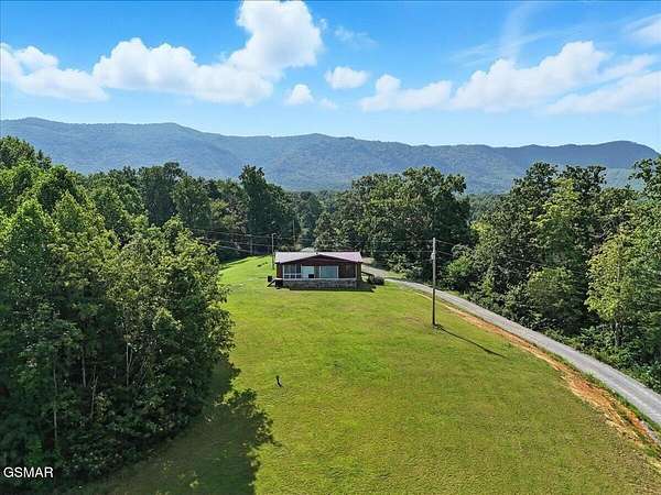 7.62 Acres of Residential Land with Home for Sale in Dandridge, Tennessee